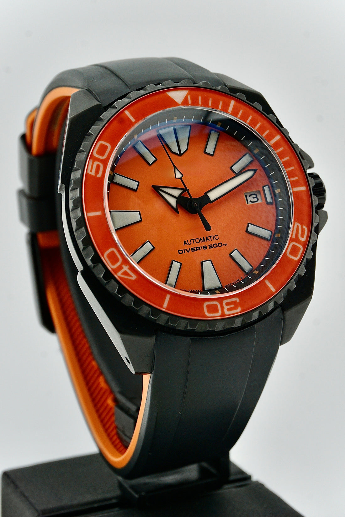 SAM SKTL Series with orange dial and grey strap